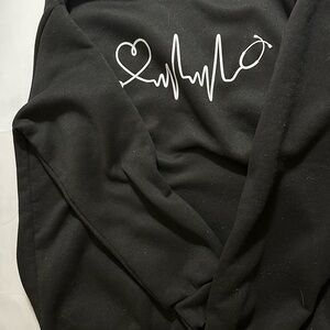 Black Pullover Sweatshirt with White Heartbeat Graphic